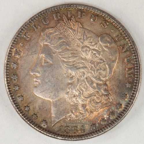 1884-O モーガン シルバー ダラー (未使用、ブルー & フラッシュ オレンジ トーニング、表裏)