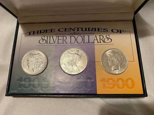 ホルダーに収められた3世紀分の銀貨：1889 VF、2000 ASE BU、1925 VF
