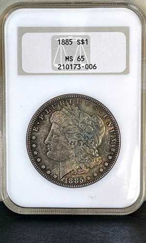 1885 年モルガン シルバー ダラー NGC MS65「オールド ブラウン ホルダー」 - 間違いなく唯一無二の逸品です。