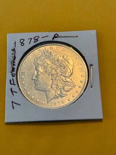モルガン銀貨。1878年製（尾羽根7枚）UNC