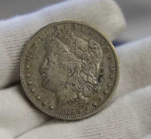1899 O 米国モルガン銀貨 $1 XF (クリーニング済み)