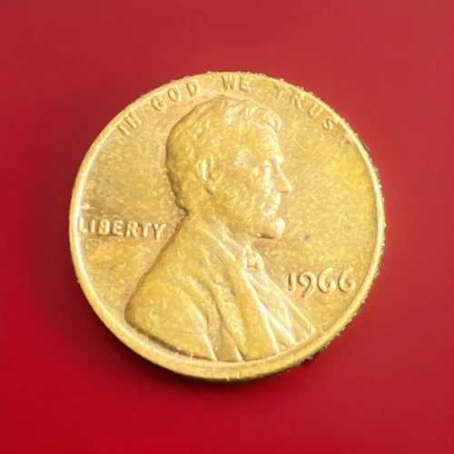 1966年リンカーン・ペニー（未使用品）。上部の縁にエラー、縁に「L」の文字（リバティ）あり。希少！