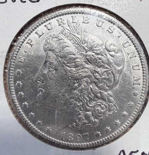 1897-O モルガン銀貨、チョイス AU+。(12975)