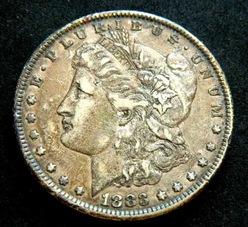 1883年製 1ドルモルガン銀貨。米国造幣局発行の本物。