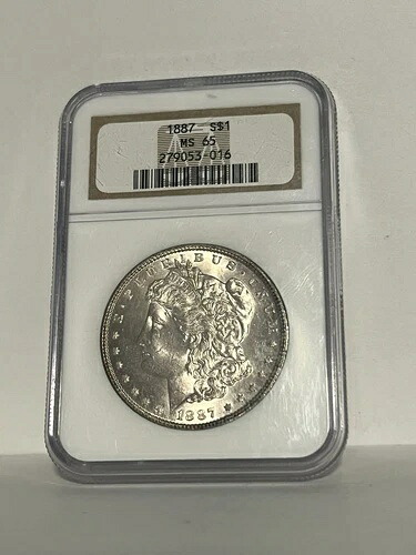 1887年 モルガン銀貨 NGC MS65 ~~ 前面はライトローズゴールドトーン