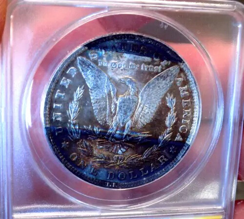 モーガン シルバードル 1884 O ANACS MS 63+++ モンスターワイルドレインボーインセインコイン