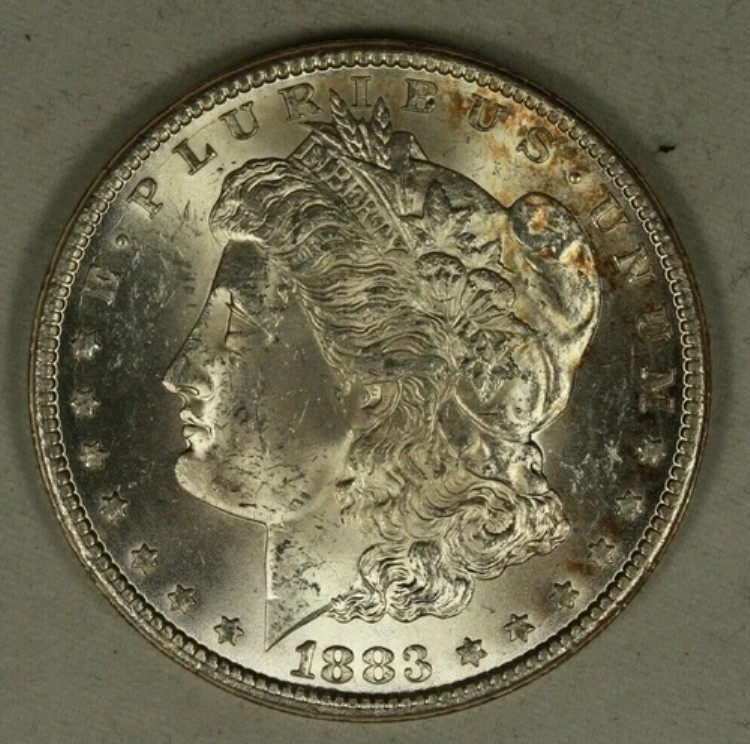 1883-CC モーガン銀貨 1ドル。カーソンシティの人気商品、未使用品。