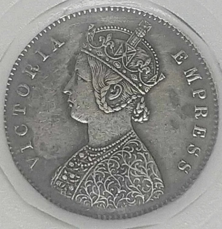 イギリス領インド。1877年、ハーフルピー。キーデート。カルカッタ造幣局。高品位。希少。