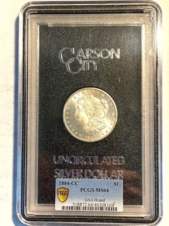 #A9009、モルガン銀貨、GSA ホード ゴールド シールド PCGS MS64 1884 CC、箱と証明書付き