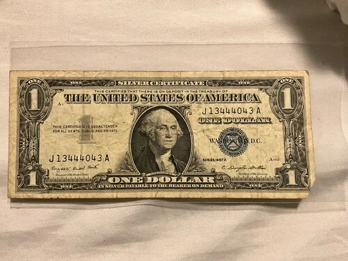 1957年A 1ドル ブルーシール 銀貨証明書 中央揃えなし 縁が不均一｜WORLD RESOURCE【KING店】