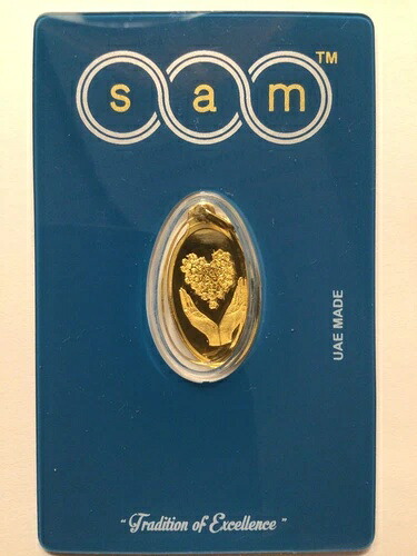 2.5グラム .9999 純度 24K 純金 SAM オーバル「ハートのブーケ」ペンダント（鑑定済み）