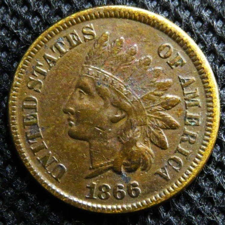 裏面に大きなひび割れがある、ほぼ未使用の1866年製インディアンヘッドセント