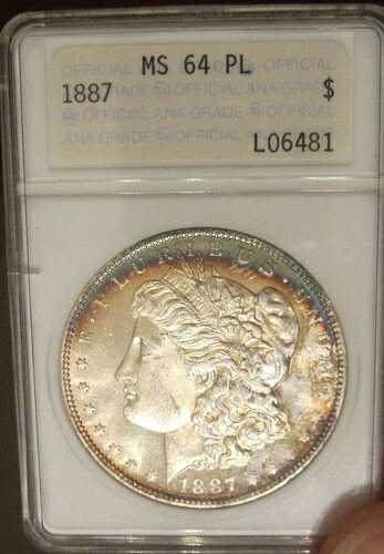 1887年モルガン銀貨 - 旧ANAホルダー MS 64 PL、カラフルトーニング 4409｜WORLD RESOURCE【KING店】