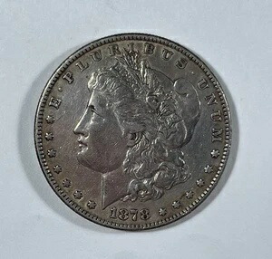 1878年 8TF モルガン・ダラー (#21403) AUクリーニング済み。表面は顎に傷あり。