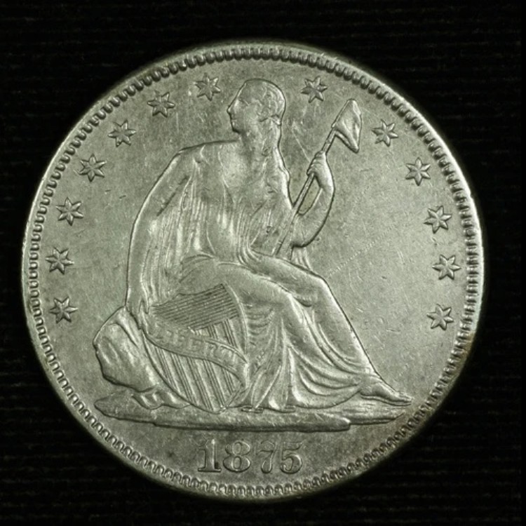 自由の女神像半ドル硬貨。1875年製。ほぼ未使用。ロット番号:9049-104-056