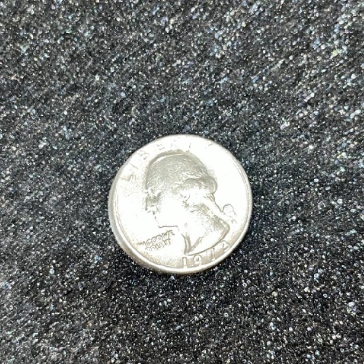 1973年ワシントン25ドル硬貨（流通品、ミントマークなし、リムエラーあり）