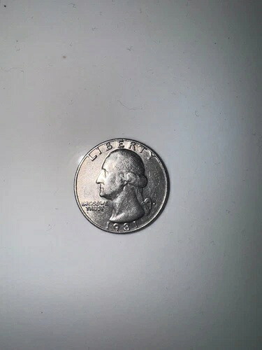 1981年25セント硬貨「In Cod We Trust」