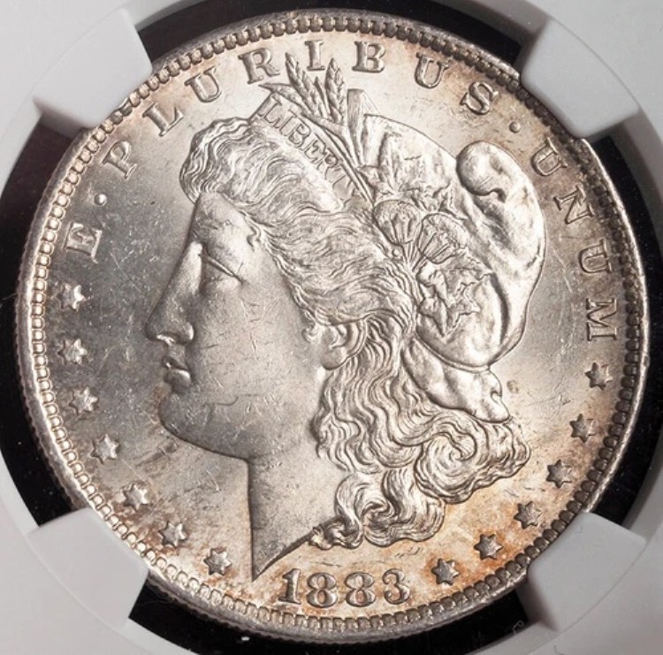 1883-O年、アメリカ合衆国。美しい大型モルガン・ダラー銀貨。NGC MS-63！