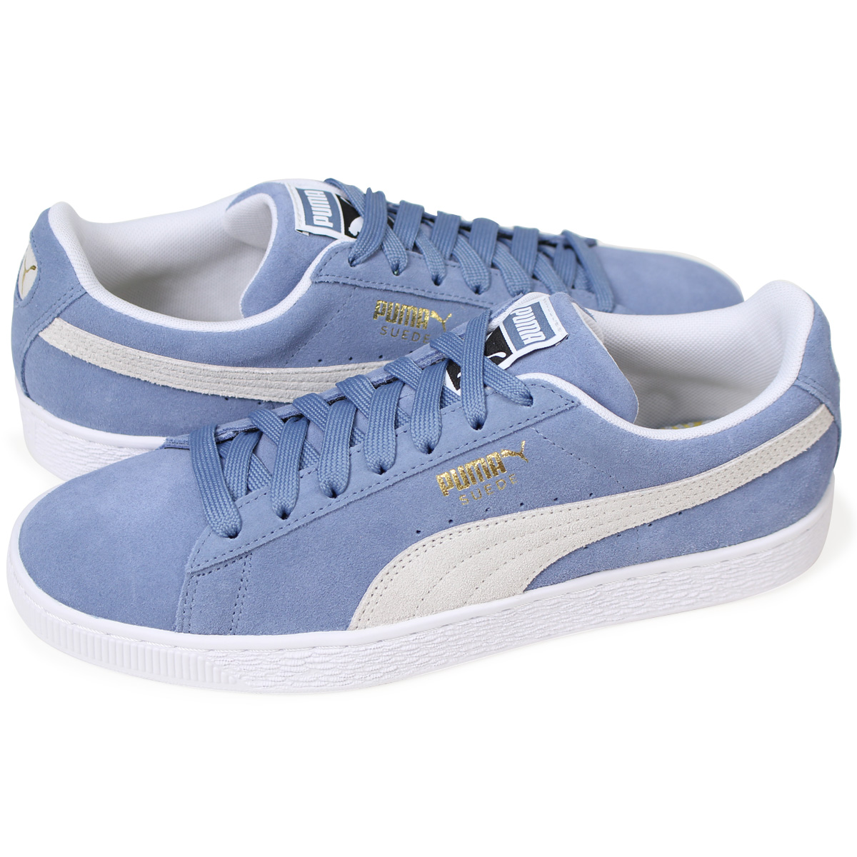 grey and blue puma shoes
