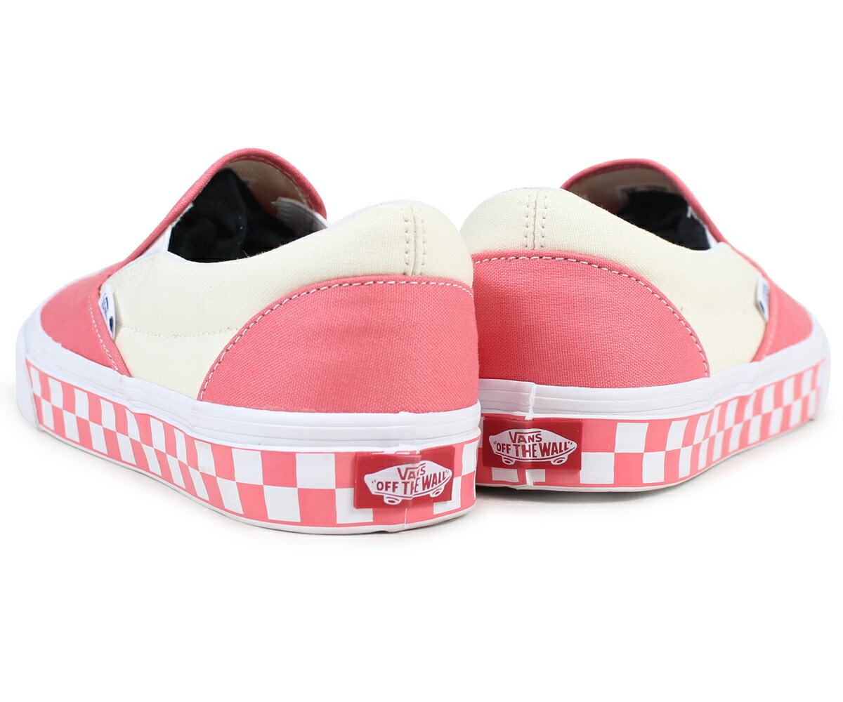 pink and white slip on vans