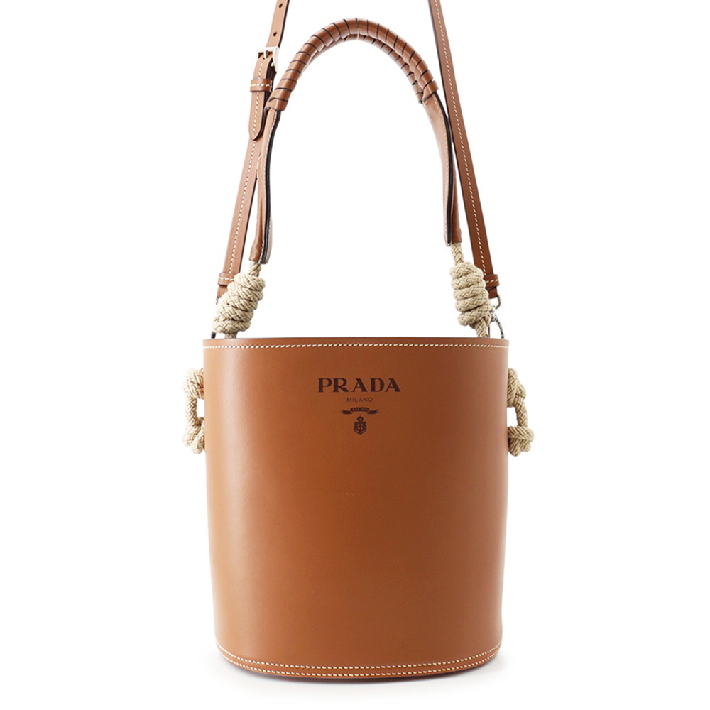 プラダ ショルダーバッグ タンブールバケット ロゴ カーフレザー 1BE050 PRADA 2way 【安心保証】 【中古】 プラダ バッグ PRADA BAG｜ブランド腕時計専門店タイムゾーン