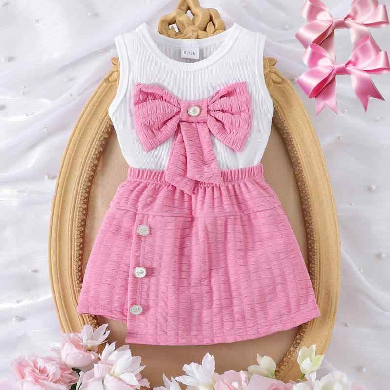 ベビー服 女の子 セットアップ 上下セット 2点セット 欧米風 かわいい リボン ノースリーブ トップス 綿 ピンク 夏 薄手 変形デザイン アシンメトリー キュロット スカート風パンツ カジュアル おでかけ｜way-ugo