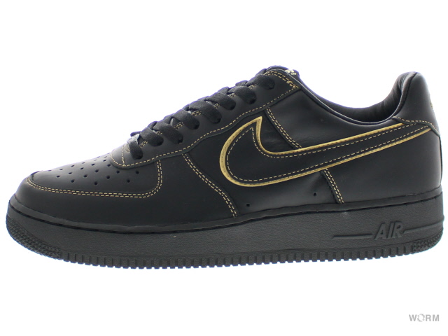 black air forces with gold
