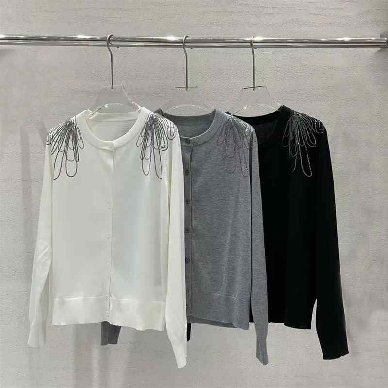 編み物 ジレー 亭主もち用 長袖 丸首 肩部 ビーズチェーン店 スパンコール 捏ち上げる刺しゅう 地絹 羊毛 雑ぜ合わせる原料品 御前上等感 磨き上げる 歳月 普段使い走り トップス