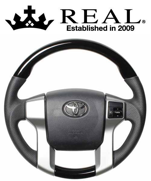 REAL STEERING オリジナルシリーズ ガングリップ トヨタ ランドクルーザープラド 前～中期 150系用 カラー：ピアノブラック (J150G-PBW-BK)【ハンドル】【自動車パーツ】レアル ステアリング｜矢東タイヤ