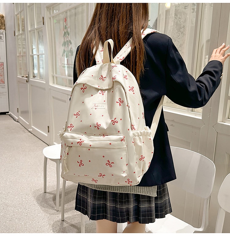 リュック レディース 通学 かわいい リボン柄 ドット 総柄 バックパック 女の子 中学生 高校生 大学生 大容量 軽量 A4 キャンバス おしゃれ カジュアル デイパック 女子 修学旅行 遠足｜Yokos