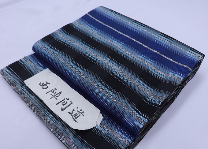 特選西陣織 袋帯【新品◇未仕立てもの】◆正絹【西陣 佐々木染織（株）】青・黒系 支離滅裂な縞 銀通し 折り目正しい帯