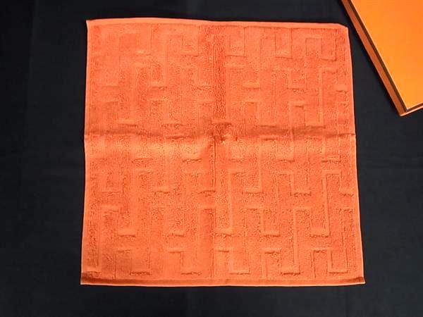 ■新品負けず劣らず■ HERMES エルメス ステアーズ カレタオル 綿織物100％ 御手々西洋手ぬぐい 人間の顔西洋手ぬぐい オレンジ色系 FX1811